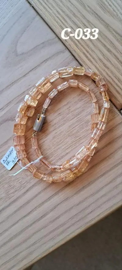 C-033 Collier Topas, Zylinderförmige, facetierte  herbstgoldenfarbene Steine, je nach Lichteinfall zeigen sie sich leuch