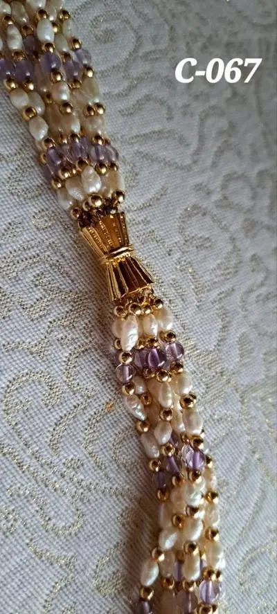 C-067 Collier 6-Reiher Keshiperlen, Stein Amethyst, 
53cm lang, Schraubverschluss, 
Fr. 250.-